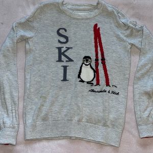 Cotton ski themed pull over sweater.